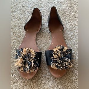 Madewell raffia Pom Pom sandals.